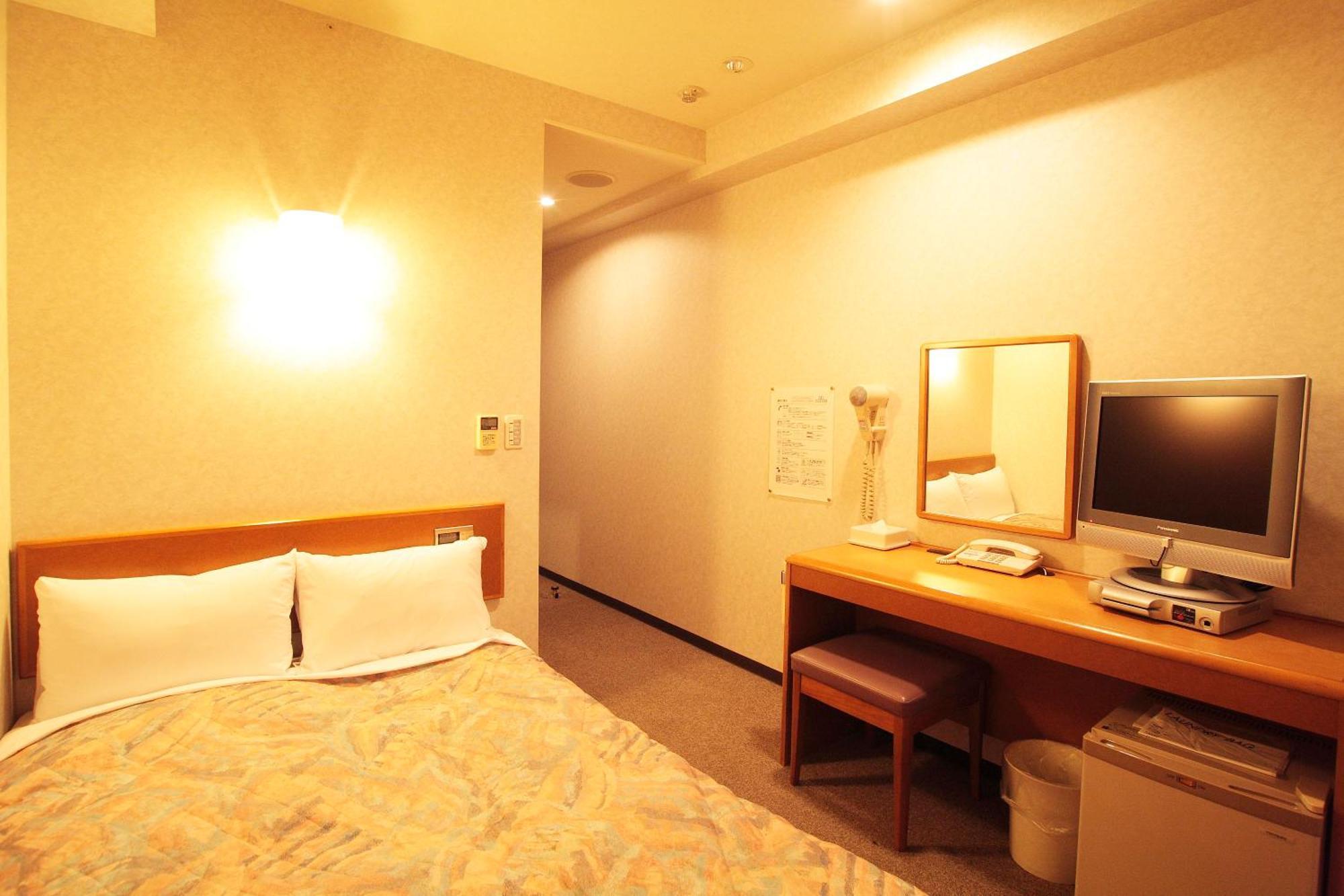 Hotel New Budget Sapporo Habitación foto